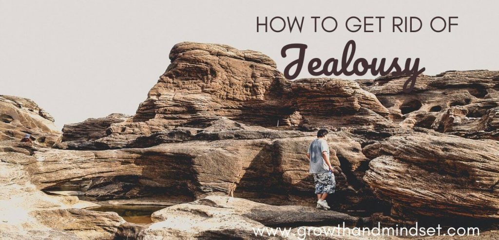 How to Get Rid of Jealousy. Man walking on big rocks.