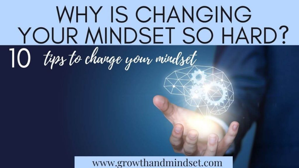 Why is changing your mindset so hard? 10 Tips to change your mindset. person holding a drawing light up mind.